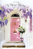 This Gospel Oak entrance scene captures the tender excitement of settling into a new home, rendered through pastel colour and abundant bloom. Overhead, wisteria cascades in loose, flowing curtains of lavender and lilac, its blossoms dense yet airy, like strands of fragrant beads hanging over the doorway. The vines arch across a whitewashed wall, their organic curves contrasting with the clean, simple lines of the building. Centred in this frame is a pink front door in a soft, comforting hue, neither too bright nor too muted, radiating a sense of kindness and welcome reminiscent of the cosy terraced houses off Weedington Road. The surface appears gently brushed, with subtle texture that suggests the care of someone who has painted it by hand. To one side, a pale shutter draws in stray rays of light, creating delicate shadows that move diagonally across the façade and bring quiet movement to the composition. On the step, a grey metal bucket functions as a rustic vessel for a generous bouquet of roses. The blooms are creamy white and ivory, plump and fully open, their layered petals forming plush, rounded rosettes. Sprays of soft green foliage weave among the flowers, offering contrast and a hint of untamed garden charm, as if freshly gathered from a courtyard near Gospel Oak Flowers. Around the bucket's base, a blush-pink ribbon is tied in a gentle bow, its satin finish echoing the door's pastel shade and completing the colour story. The image feels still yet full of anticipation-perfect for illustrating a new home card or housewarming flowers that speak of comfort, hope, and the quiet promise that this doorway will witness many future memories.